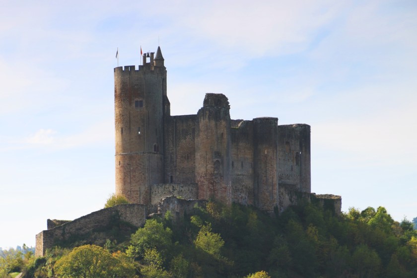 A picture of a stone fortress against a cloudy sky